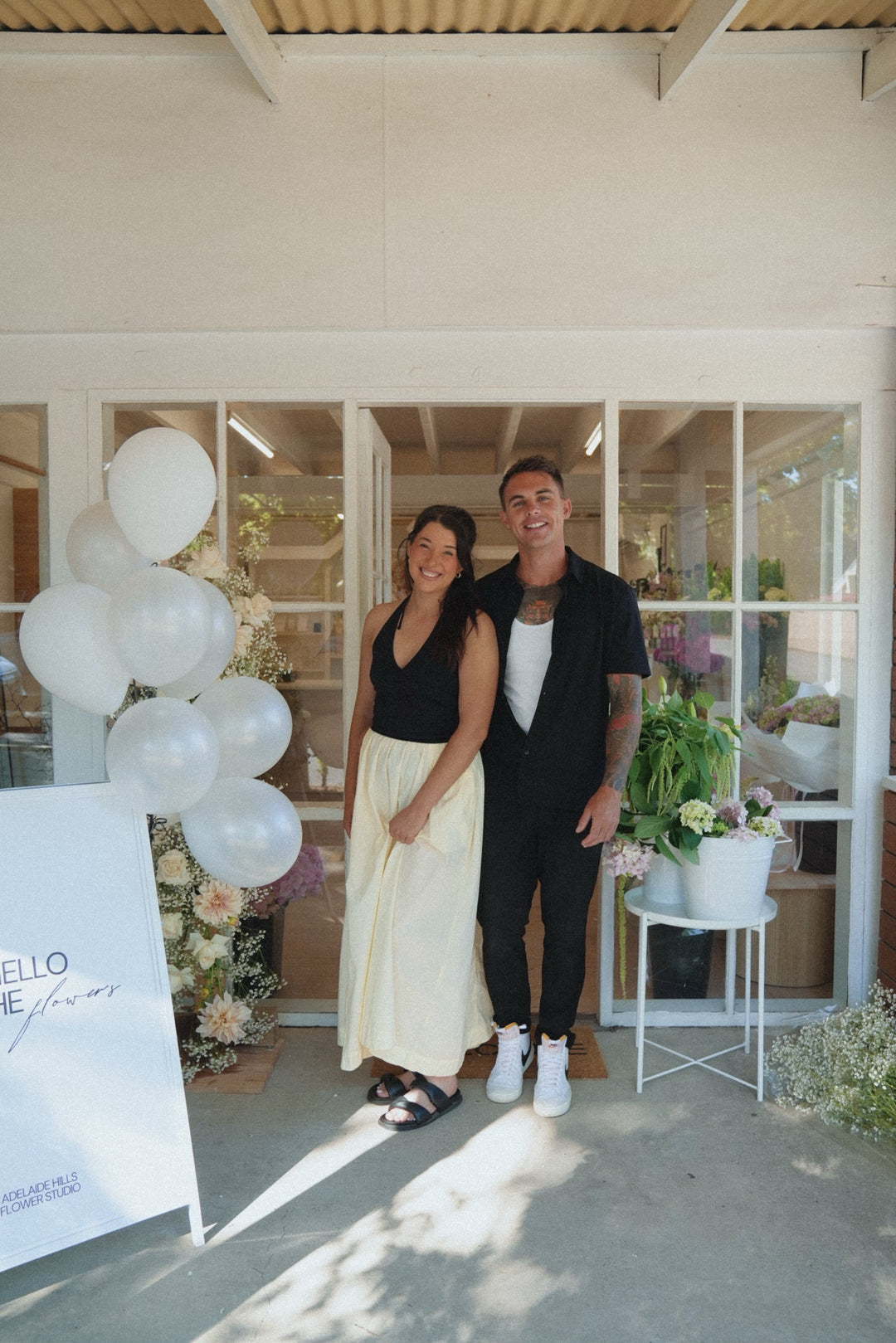 Hahndorf florist Blume Hütte previously known as Adelaide Hills Flower Studio. Owners Adeline and Jon standing out the front of their flower shop